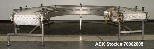 Used SSI 180 Degree U Shaped Belt Conveyor. 17-1/2" wide x 198" long plastic belt. Driven by a Baldor stainless steel washdown motor, 1-1/2 hp, 3/60/208- 230/460 volt, 1740 rpm motor thru a reducer, ...