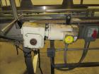 Used American Conveyor stainless steel conveyor system includes (2) Leeson drive motors, (2) 90 degree radius turn sections, and (3) straight runs -SUBJECT TO ENTIRETY BID