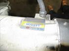 Used American Conveyor stainless steel conveyor system includes (2) Leeson drive motors, (2) 90 degree radius turn sections, and (3) straight runs -SUBJECT TO ENTIRETY BID