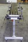 Used Dorner Portable Conveyor with Eagle belting. Unit is 5' long x 8