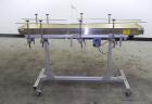 Used Dorner Portable Conveyor with Eagle belting. Unit is 5' long x 8