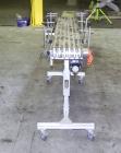 Used Dorner Portable Conveyor with Eagle belting. Unit is 5' long x 8