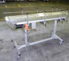 Used Dorner Portable Conveyor with Eagle belting. Unit is 5' long x 8