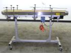 Used Dorner Portable Conveyor with Eagle belting. Unit is 5' long x 8