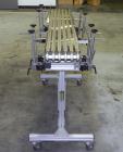 Used Dorner Portable Conveyor with Eagle belting. Unit is 5' long x 8