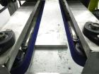 Used Garvey Model 1550 Side Belt Transfer Conveyor. Has Motor Master 20000 variable speed drive. Machine is of stainless steel construction. Has spare conveyor head. 1/3/110V.