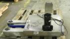 Used Garvey Model 1550 Side Belt Transfer Conveyor. Has Motor Master 20000 variable speed drive. Machine is of stainless steel construction. Has spare conveyor head. 1/3/110V.