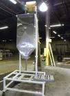 Used Kamflex Inclined Belt Conveyor, Model 705. 12’’ Wide x approximately 180’’ long rubber cleated belt. 6’’ Long pockets with 3’’ tall cleats. End feed hopper. Driven by an approximate 1/2 hp, 1/60...