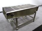 Used Wire Mesh Cooling Conveyor, 304 Stainless Steel. 22'' wide x 60'' long. Driven by a 1/2 hp, 90 volt, 1750 rpm DC gear motor, ratio 43 to 1. Includes a Bronco DC speed controller. 36'' high belt ...