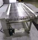 Used Wire Mesh Cooling Conveyor, 304 Stainless Steel. 22'' wide x 60'' long. Driven by a 1/2 hp, 90 volt, 1750 rpm DC gear motor, ratio 43 to 1. Includes a Bronco DC speed controller. 36'' high belt ...