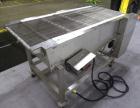 Used Wire Mesh Cooling Conveyor, 304 Stainless Steel. 22'' wide x 60'' long. Driven by a 1/2 hp, 90 volt, 1750 rpm DC gear motor, ratio 43 to 1. Includes a Bronco DC speed controller. 36'' high belt ...