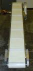 Used Inclined Belt Conveyor. 12'' wide x 92'' long rubber belt with 1'' tall cleats, spaced approximately 12'' apart. 36'' belt discharge height. Driven by a 3/4 hp, 3/60/230/460 volt, 1725 rpm gear ...