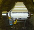 Used Inclined Belt Conveyor. 12'' wide x 92'' long rubber belt with 1'' tall cleats, spaced approximately 12'' apart. 36'' belt discharge height. Driven by a 3/4 hp, 3/60/230/460 volt, 1725 rpm gear ...