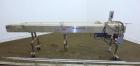 Used Johnson Nash Stainless steel belt conveyor. Approximately 10'L x 8