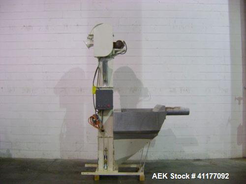 Used Meyer Bucket Elevator, Carbon Steel. 40" x 43" x 48" deep infeed hopper. 4" x 3" poly buckets. Discharge height is 100". Baldor 3/60/208/230/460V motor. OAD: 120" x 43" x 80". Last feeding pet f...