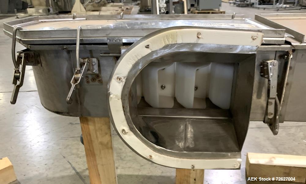 Used Universal Industries SC Series Bucket Elevator, Model SC-SS6 LH. Stainless steel construction. 6" x 4" HDPE buckets. Driven by a 1hp, 3/60/230/460 Volt, 1745 rpm gear motor. Approx 19 1/2' disch...