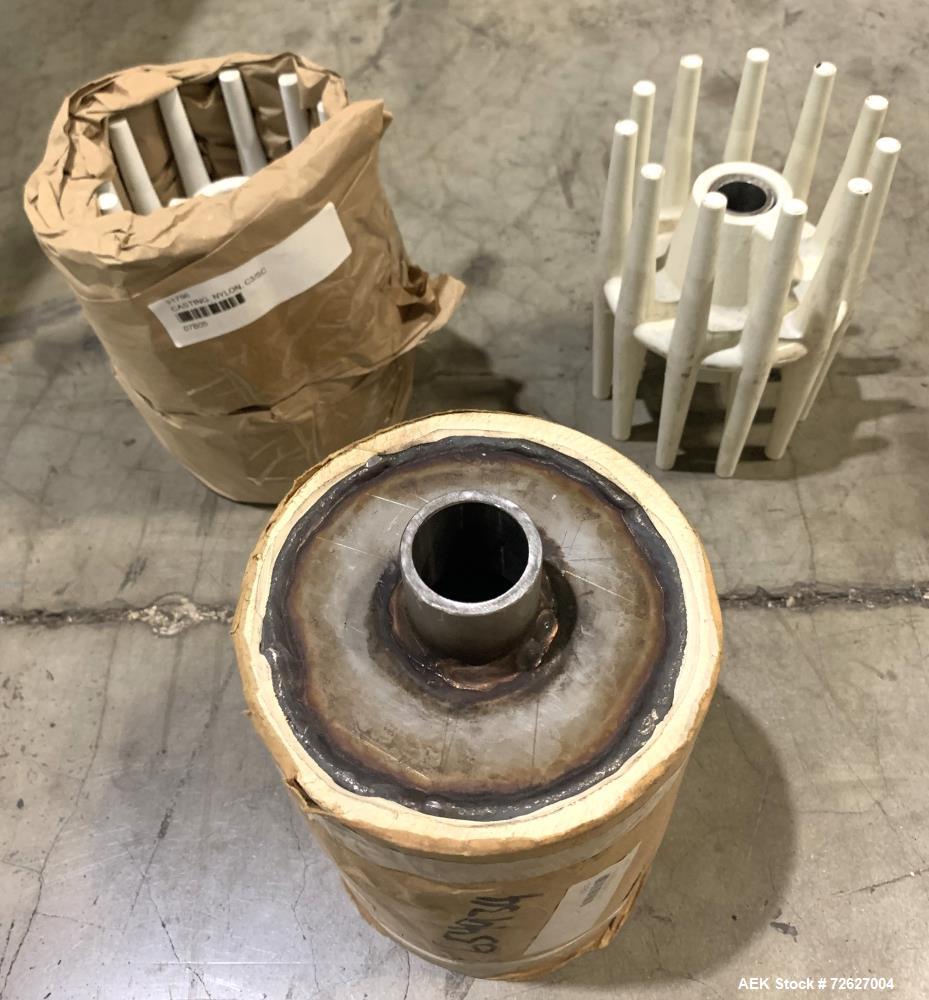 Used Universal Industries SC Series Bucket Elevator, Model SC-SS6 LH. Stainless steel construction. 6" x 4" HDPE buckets. Driven by a 1hp, 3/60/230/460 Volt, 1745 rpm gear motor. Approx 19 1/2' disch...