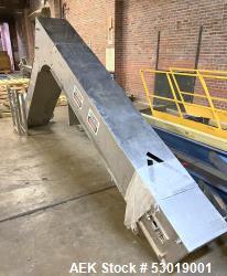 Used- PSG-Dallas Z-Inclined Conveyor. Stainless steel outer, with Plastic Belt. Approximate 15-1/4" wide, cleat 14" wide x 3...