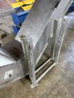 Used- PSG-Dallas Z-Inclined Conveyor. Stainless steel outer, with Plastic Belt. Approximate 15-1/4