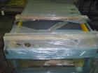 Used Unused-Hytrol pallet conveyor, new in crate. Drag chain conveyor will lift and rotate pallet 90 degrees. 7' OAL x 40-7/8 OAW. Elevation 29