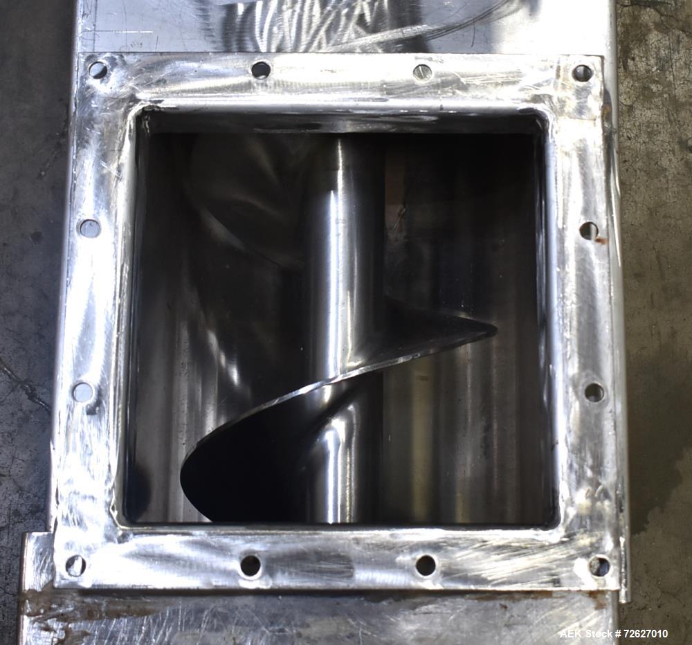 Used Screw Conveyor, 304 Stainless Steel. Approximate trough 110" long x 10-1/2" wide x 10-1/2" deep. Top infeed 10" x 10", 6" bottom discharge. Screw approximately 8-1/2" diameter x 110" long. Drive...