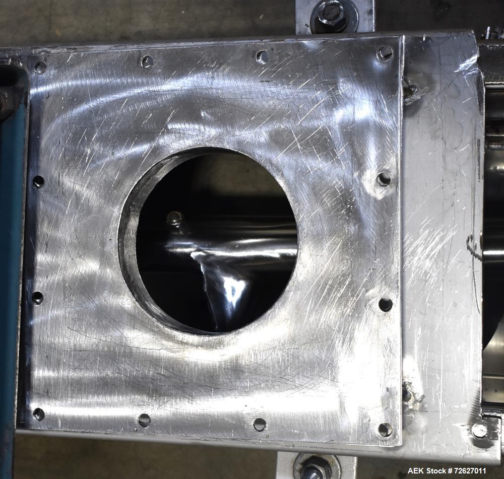 Used Screw Conveyor, 304 Stainless Steel. Approximate trough 110" long x 10-1/2" wide x 10-1/2" deep. Top infeed 10" x 10", 6" bottom discharge. Screw approximately 8-1/2" diameter x 110" long. Drive...