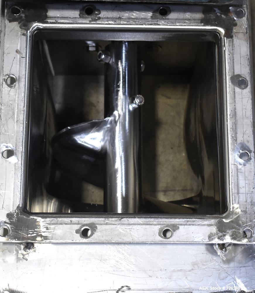 Used Screw Conveyor, 304 Stainless Steel. Approximate trough 110" long x 10-1/2" wide x 10-1/2" deep. Top infeed 10" x 10", 6" bottom discharge. Screw approximately 8-1/2" diameter x 110" long. Drive...