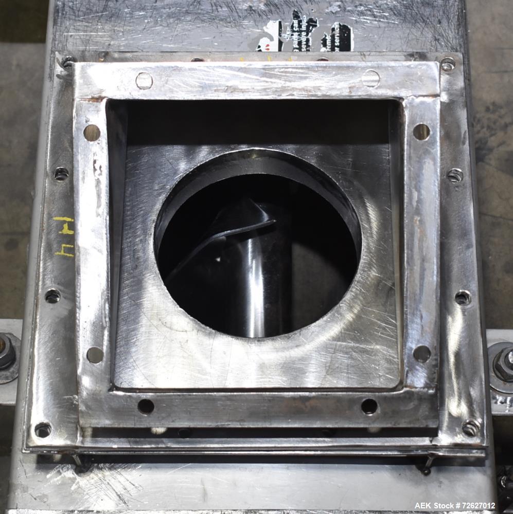 Used Screw Conveyor, 304 Stainless Steel. Approximate trough 110" long x 10-1/2" wide x 10-1/2" deep. Top infeed 10" x 10", 6" bottom discharge. Screw approximately 8-1/2" diameter x 110" long. Drive...