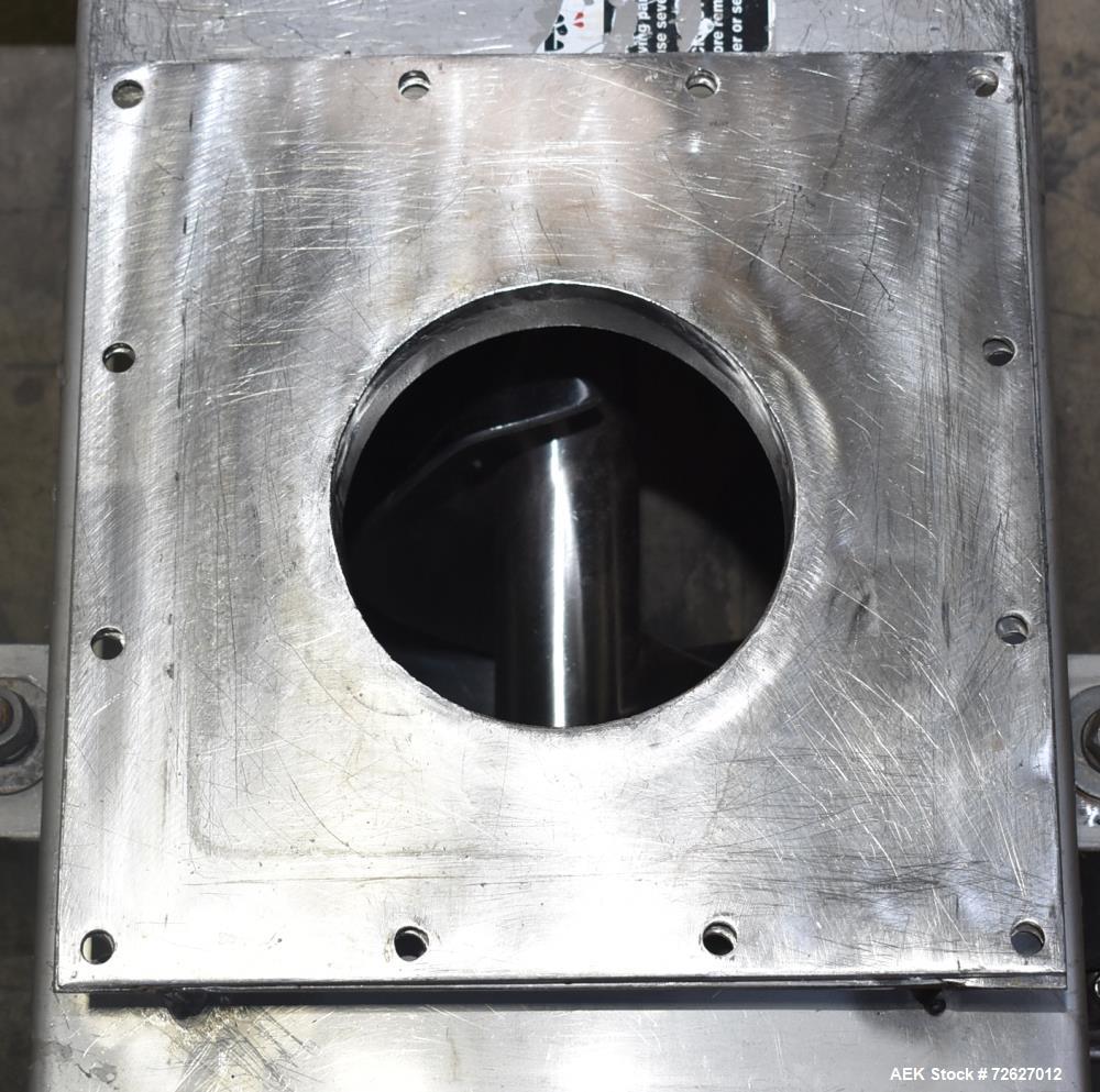 Used Screw Conveyor, 304 Stainless Steel. Approximate trough 110" long x 10-1/2" wide x 10-1/2" deep. Top infeed 10" x 10", 6" bottom discharge. Screw approximately 8-1/2" diameter x 110" long. Drive...