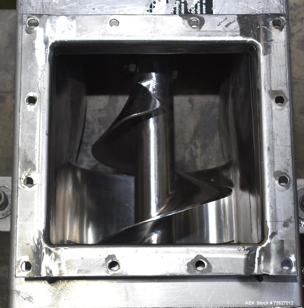 Used Screw Conveyor, 304 Stainless Steel. Approximate trough 110" long x 10-1/2" wide x 10-1/2" deep. Top infeed 10" x 10", 6" bottom discharge. Screw approximately 8-1/2" diameter x 110" long. Drive...