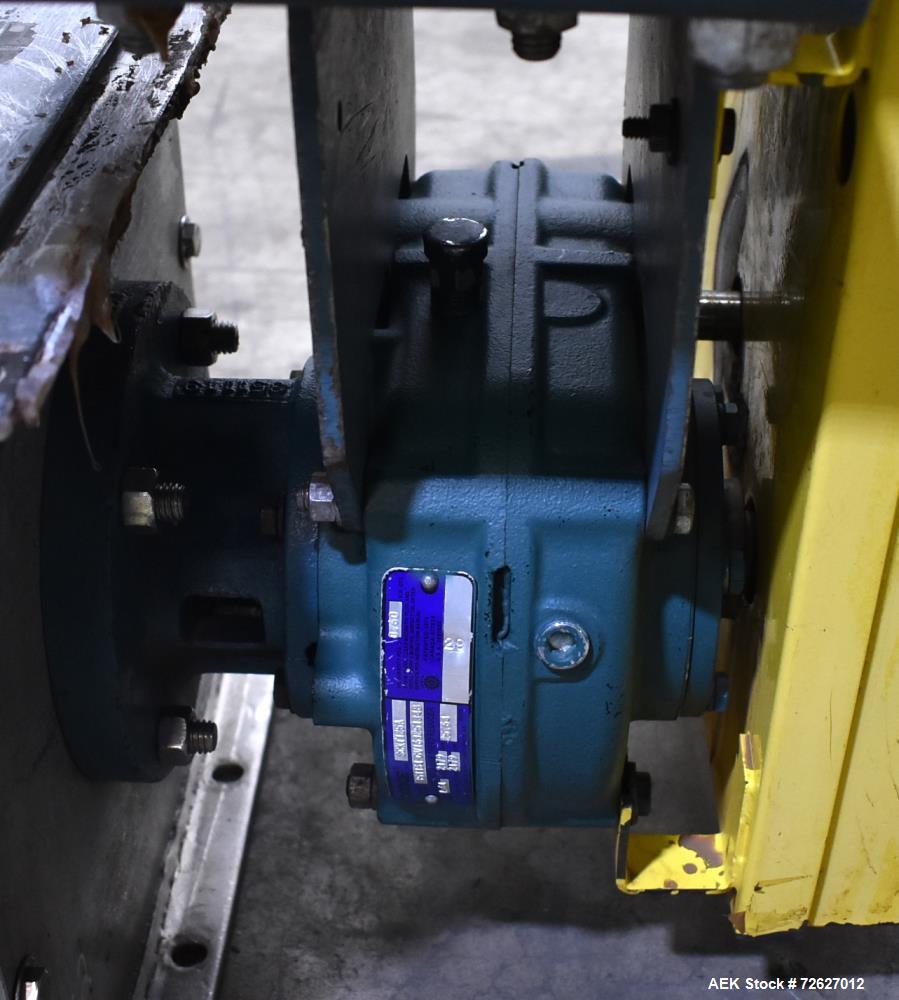 Used Screw Conveyor, 304 Stainless Steel. Approximate trough 110" long x 10-1/2" wide x 10-1/2" deep. Top infeed 10" x 10", 6" bottom discharge. Screw approximately 8-1/2" diameter x 110" long. Drive...