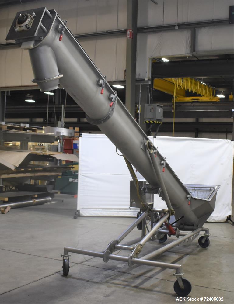 Used Bulk Material Incline Screw Conveyor. Approximate 9" diameter x 6" flight spacing x 156" tall. Adjustable discharge height. Stainless steel construction. Driven by a 3hp, 3/60/208-230/460 volt, ...