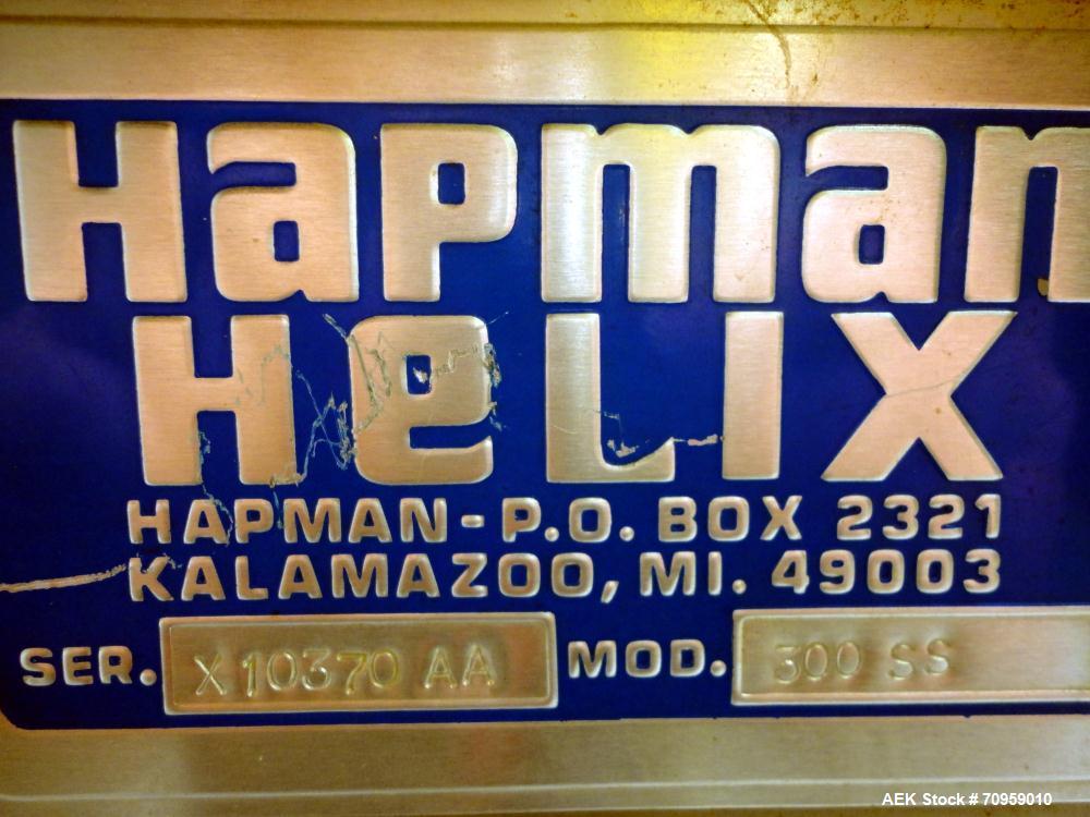 Used Hapman Model 300SS Helix Fleixible Screw Conveyor. Has 3" diameter X 120" long screw, 96" discharge height, and has a capacity of 30 to 70ft per hour. Equipped with Stainless Steel Hopper 36"L X...