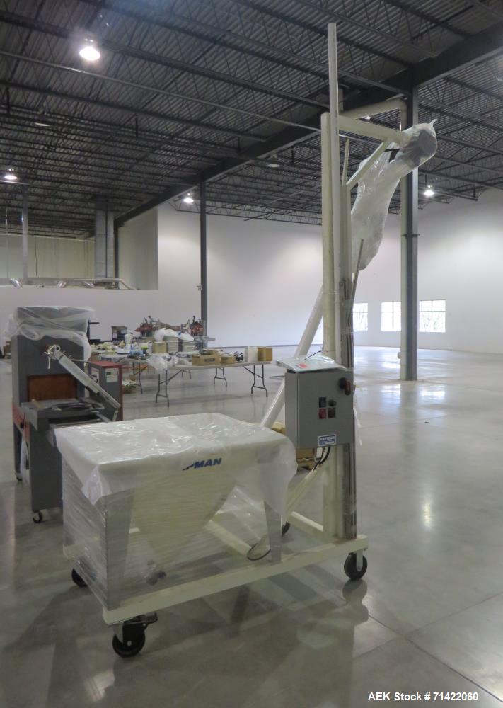 Used Hapman Helix Screw Conveyor. Has 112" tall discharge. Is constructed of fo