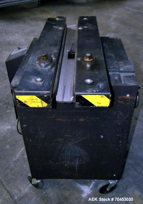 Used Dennison M400 Side Belt Gap Transfer Conveyor. Capable of speeds up to 250 CPM.  Side belt transfer for bottom coding of containers. Container size range: (length) 1" - 7" (width) 1" - 7" (heigh...