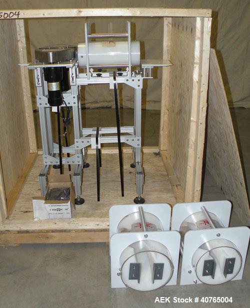 Used Carleton Helical Technologies Carleton Carton Twister. (2) 1/4hp, 90 volt dc motors, (1) Penta drive controller. Designed to gently and rapidly invert or rotate positions a variety of containers...