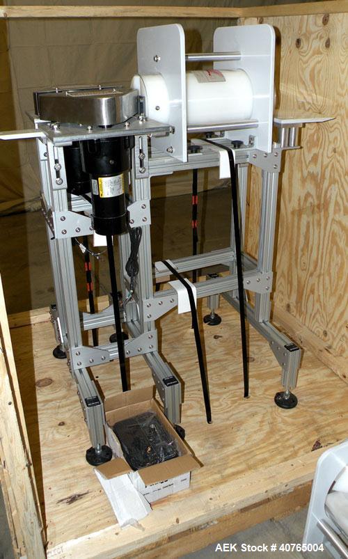 Used Carleton Helical Technologies Carleton Carton Twister. (2) 1/4hp, 90 volt dc motors, (1) Penta drive controller. Designed to gently and rapidly invert or rotate positions a variety of containers...
