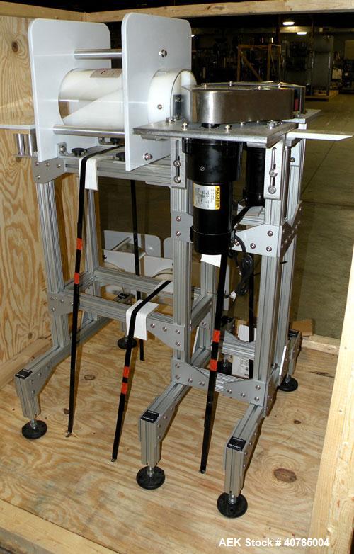 Used Carleton Helical Technologies Carleton Carton Twister. (2) 1/4hp, 90 volt dc motors, (1) Penta drive controller. Designed to gently and rapidly invert or rotate positions a variety of containers...