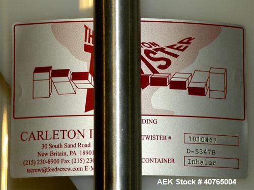 Used Carleton Helical Technologies Carleton Carton Twister. (2) 1/4hp, 90 volt dc motors, (1) Penta drive controller. Designed to gently and rapidly invert or rotate positions a variety of containers...