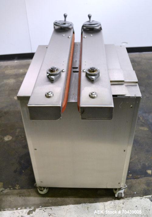 Used Digital Design M400 Transport System, Model M400TRSS, Stainless Steel. (2) 1’’ Wide x 32’’ long horizontally mounted belts. Product size range: Height 1’’ to 12’’, Width 1’’ to 7’’, Length 1’’ t...