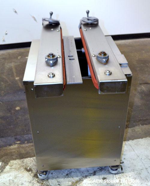Used Digital Design M400 Transport System, Model M400TRSS, Stainless Steel. (2) 1’’ Wide x 32’’ long horizontally mounted belts. Product size range: Height 1’’ to 12’’, Width 1’’ to 7’’, Length 1’’ t...