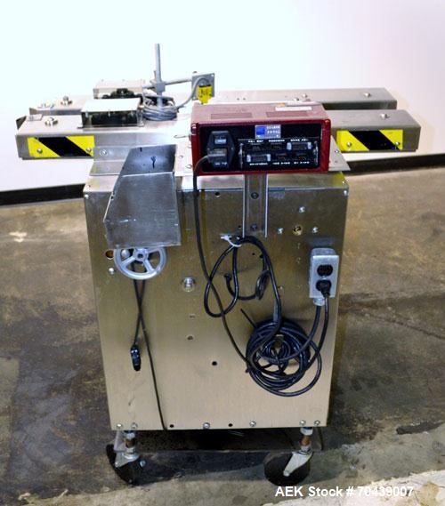 Used Digital Design M400 Transport System, Model M400TRSS, Stainless Steel. (2) 1’’ Wide x 32’’ long horizontally mounted belts. Product size range: Height 1’’ to 12’’, Width 1’’ to 7’’, Length 1’’ t...