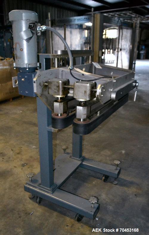 Used Gap Transfer Belt. Driven by a 3/4 HP, 90 Volt, 1725 RPM motor. SELLING PRICE AS IS, WHERE IS, SANFORD, NC.