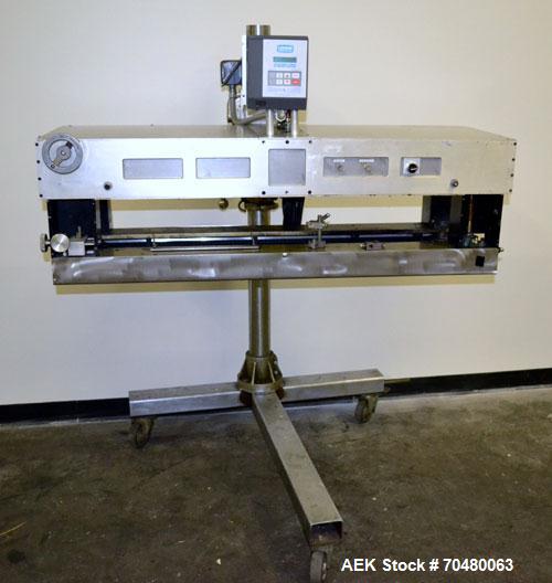 Used Side Belt Portable Transfer Conveyor. (2) Approximate 1” wide x 45” long side belts, manually adjustable to a maximum opening to 5-1/4”. Driven by a 1hp, 3/60/208-230/460 volt, 1750 rpm gear mot...