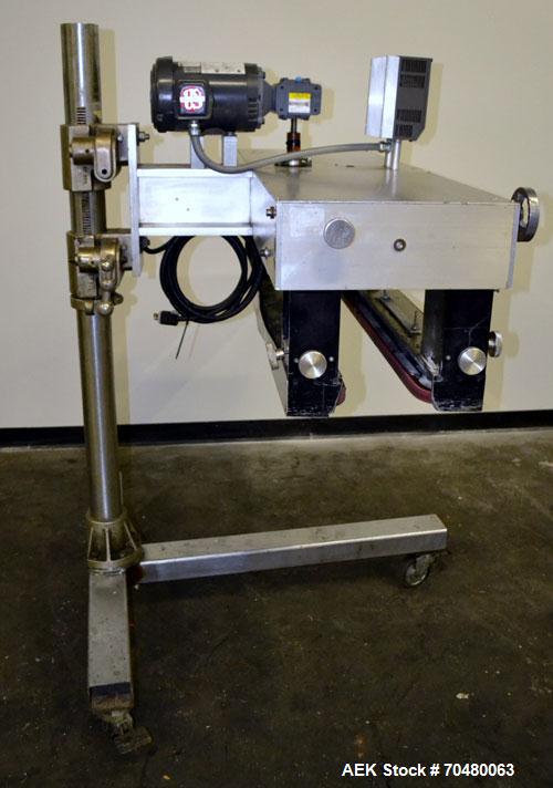 Used Side Belt Portable Transfer Conveyor. (2) Approximate 1” wide x 45” long side belts, manually adjustable to a maximum opening to 5-1/4”. Driven by a 1hp, 3/60/208-230/460 volt, 1750 rpm gear mot...