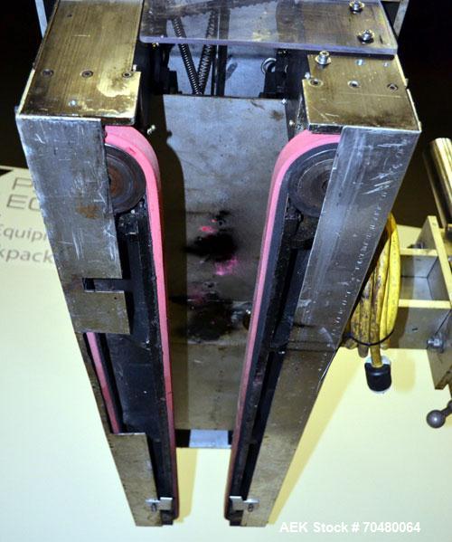 Used Side Belt Portable Transfer Conveyor. (2) Approximately 1” wide x 45” long side belts, manually adjustable from 1/2" to to a maximum opening of 4-1/4”. Driven by a 1 hp, 3/60/208-230/460 volt, 1...