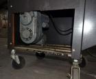 Used Dennison M400 Side Belt Gap Transfer Conveyor. Capable of speeds up to 250 CPM.  Side belt transfer for bottom coding of containers. Container size range: (length) 1