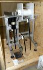 Used Carleton Helical Technologies Carleton Carton Twister. (2) 1/4hp, 90 volt dc motors, (1) Penta drive controller. Designed to gently and rapidly invert or rotate positions a variety of containers...