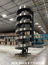 https://www.aaronequipment.com/Images/ItemImages/Packaging-Equipment/Conveyors-Spiral-Case-Conveyors/medium/Ambaflex-252_73549001_aa.jpg