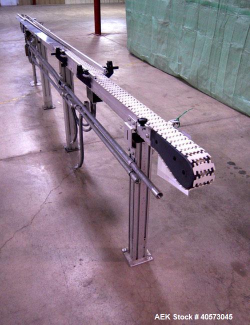 Used Flex Link Conveyor. 3 1/4" wide x 120" long plastic belt. Driven by a 1/3 hp, 90 volt, 1750 rpm DC gearmotor, ratio 20 to 1. Includes a  variable speed controller. Mounted on an aluminum frame w...